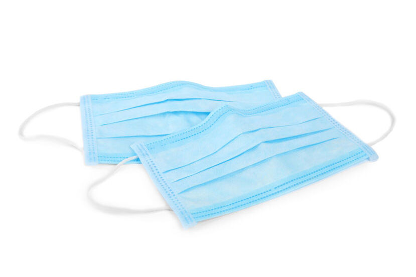 Blue medical face masks isolated on white